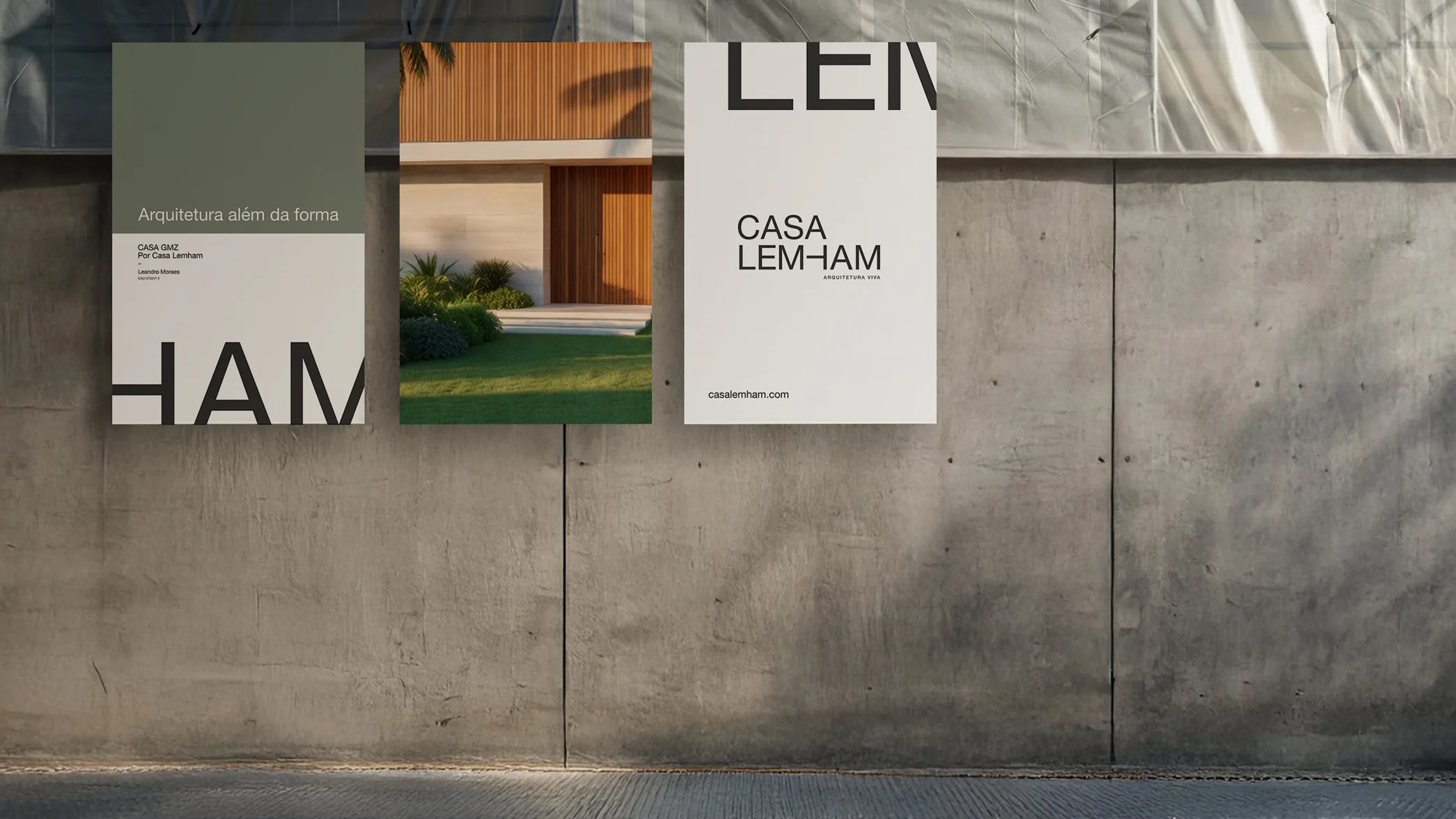 Placa de obra Casa Lemham em parede de concreto